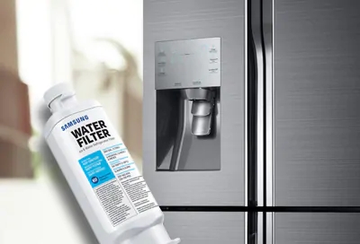 Closeup of a Samsung water filter in front of a refrigerator
